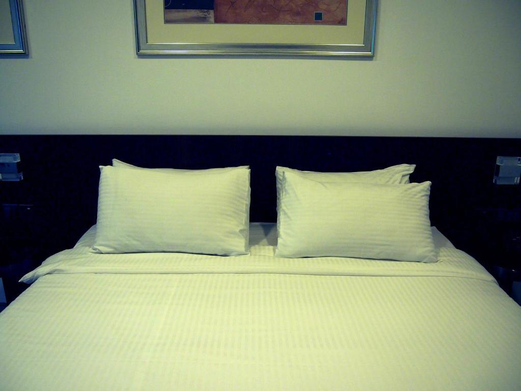 Cove D'Arena Aparthotel Szingapúr Szoba fotó