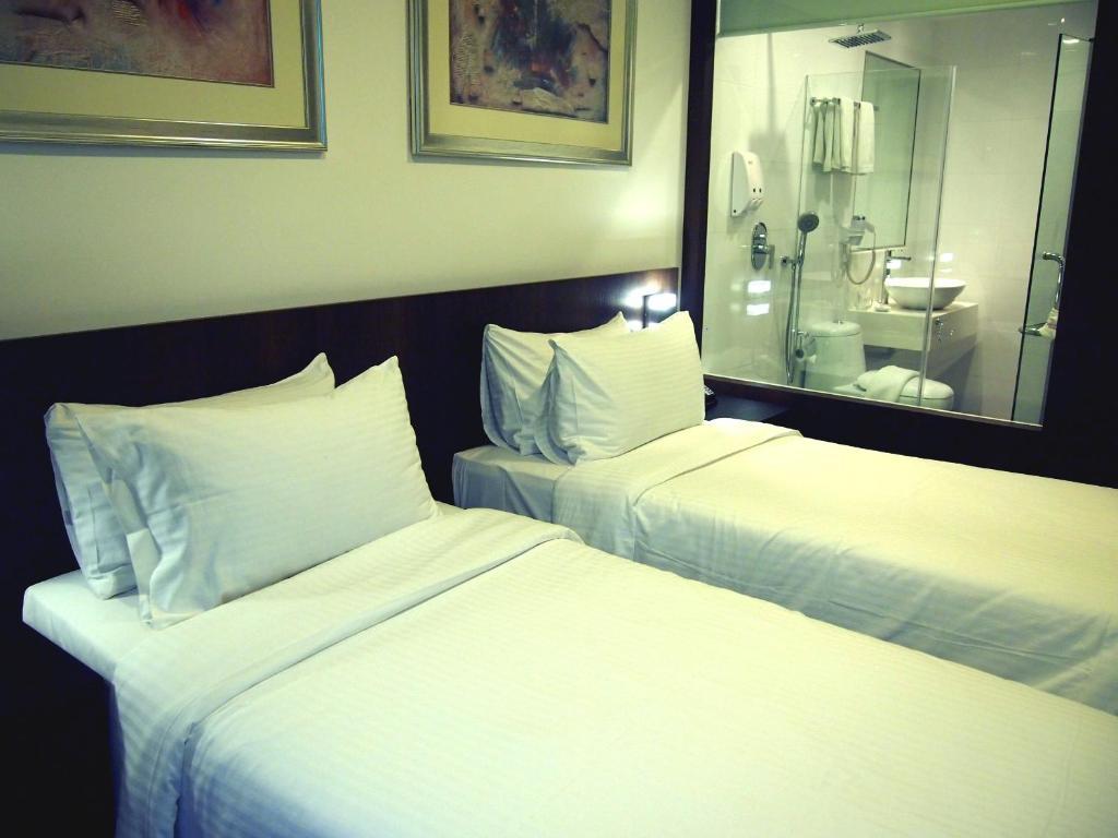 Cove D'Arena Aparthotel Szingapúr Szoba fotó