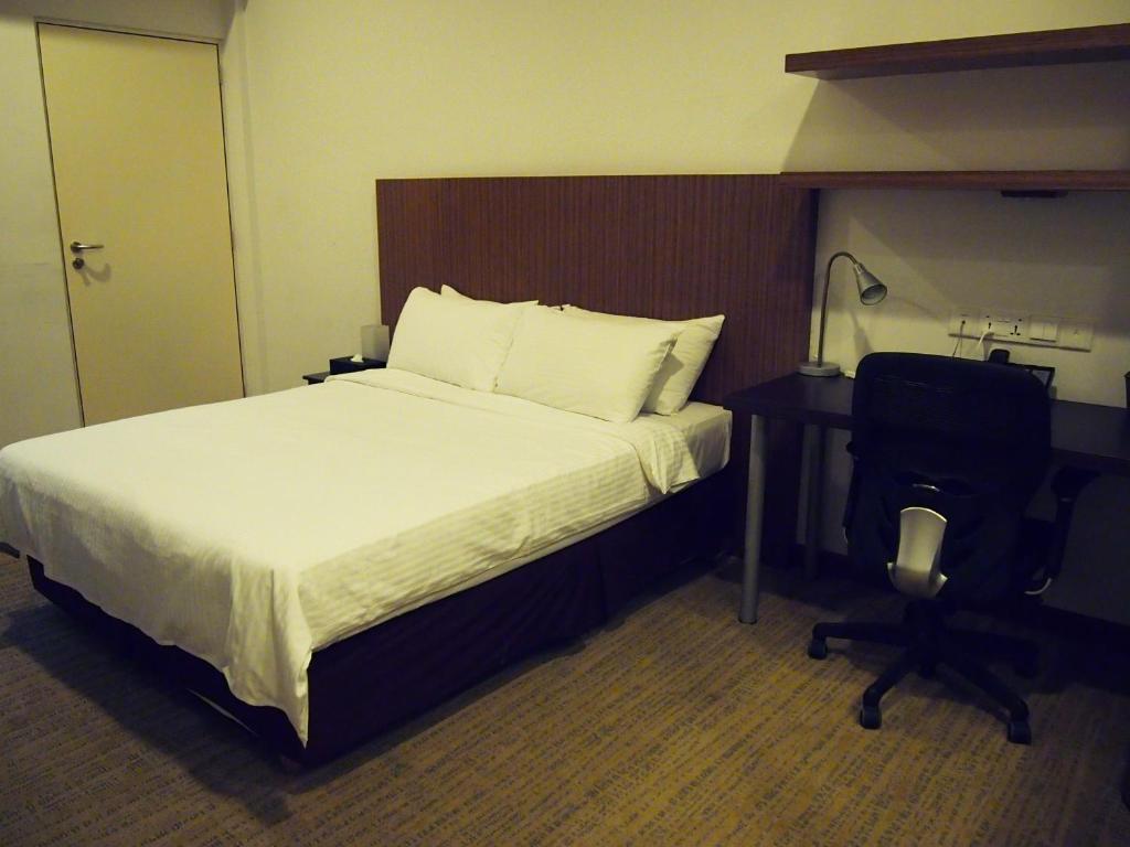 Cove D'Arena Aparthotel Szingapúr Szoba fotó