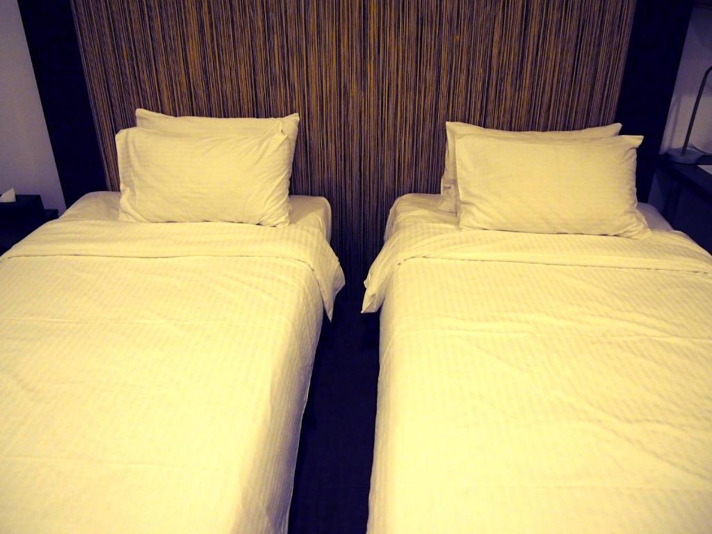 Cove D'Arena Aparthotel Szingapúr Szoba fotó