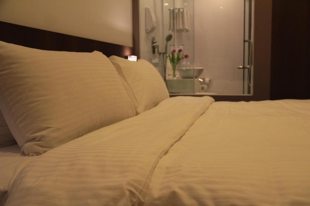 Cove D'Arena Aparthotel Szingapúr Szoba fotó