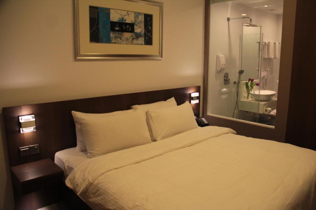 Cove D'Arena Aparthotel Szingapúr Szoba fotó