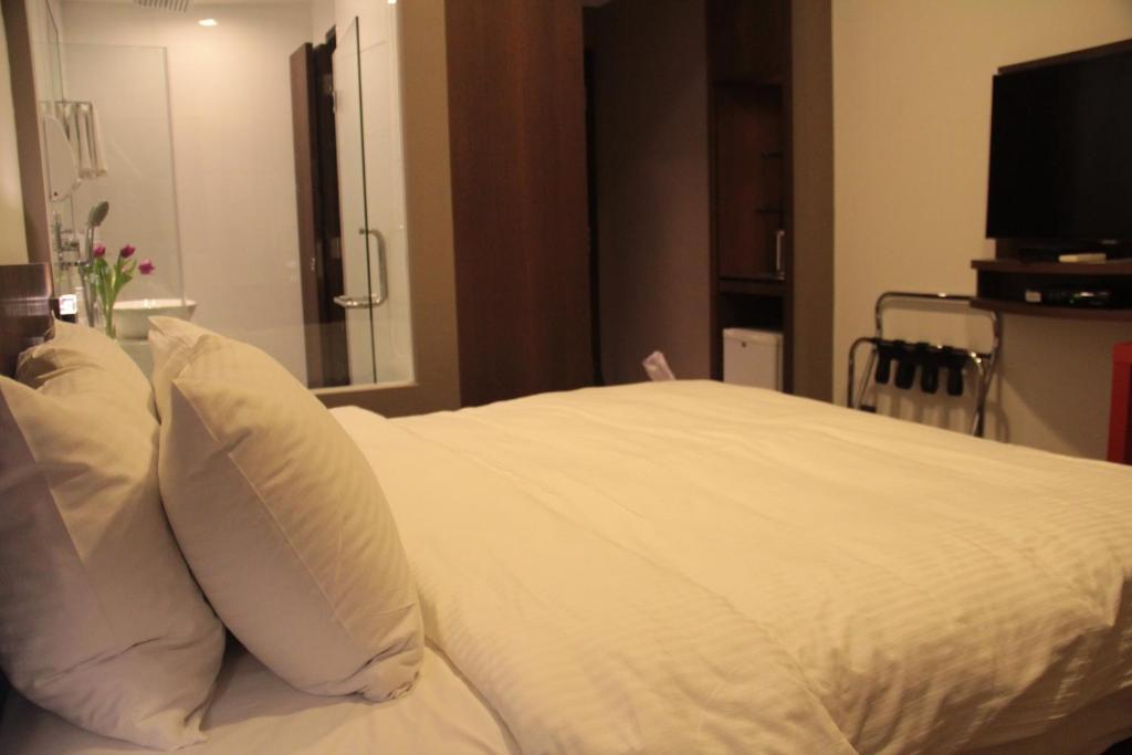Cove D'Arena Aparthotel Szingapúr Szoba fotó
